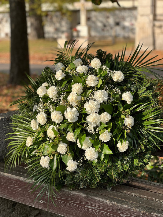 Mit üzennek a virágok színei és típusai egy temetési koszorúban?